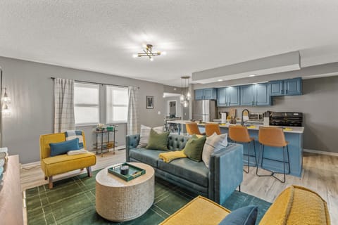 Living room with plush couch and beverage cart