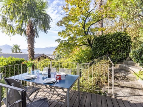 Plant, Table, Sky, Property, Furniture, Cloud, Chair, Outdoor Furniture, Tree, Outdoor Table