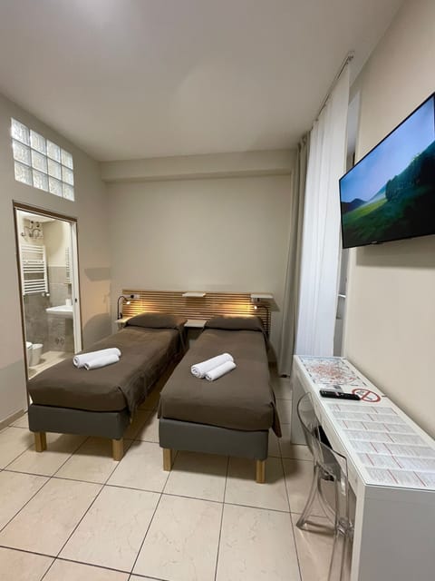 Comfort Double or Twin Room, City View | In-room safe, desk, free WiFi