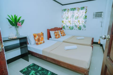 Economy Triple Room, City View | Desk, free WiFi