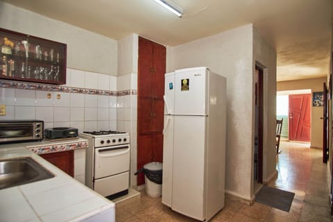 Family Apartment, Kitchen, Courtyard View | Private kitchen | Full-size fridge, microwave, oven, stovetop