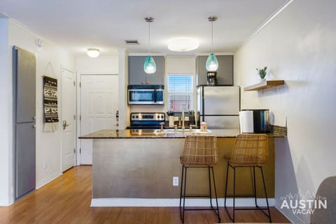 Pull up a stool and enjoy a coffee or cocktail at the inviting breakfast bar!