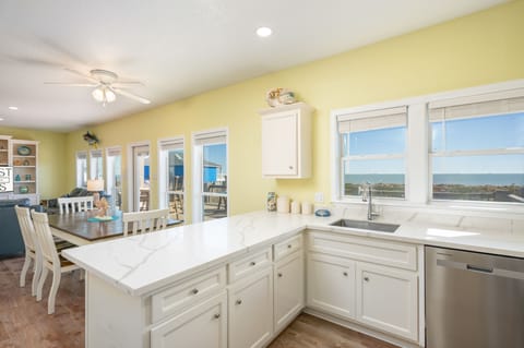 Cook, dine, and unwind in our bright, airy, fully equipped kitchen.