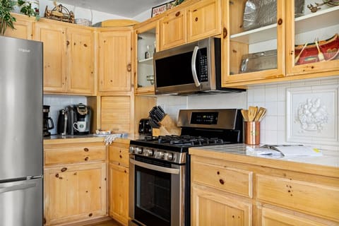 Fully equipped kitchen featuring a Keurig coffee maker.