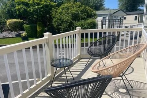 Sun-trapped patio area with lovely view of garden to enjoy your morning tea or sun-downer drink