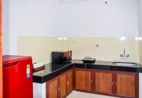 Family Suite, 2 Bedrooms | Private kitchen | Fridge, microwave, coffee/tea maker