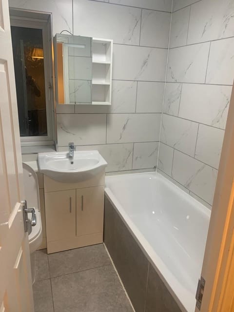 Separate tub and shower, deep soaking tub, towels