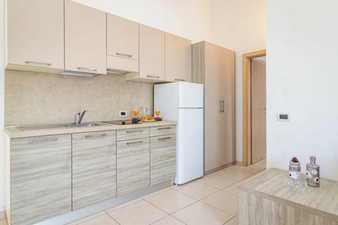 Apartment, 1 Bedroom, Balcony | Private kitchen | Fridge, microwave, stovetop, coffee/tea maker