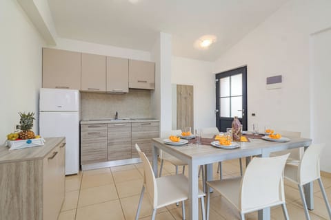 Apartment, 2 Bedrooms, Balcony | Private kitchen | Fridge, microwave, stovetop, coffee/tea maker