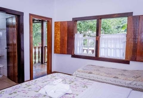 Standard Triple Room, Lanai, Garden View | Free WiFi