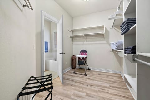Huge primary closet! This is where you'll find the high chair & pack-n-play!