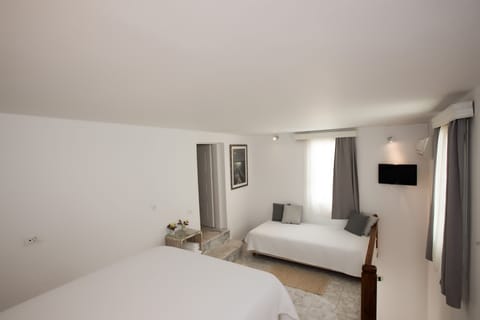 Suite, Sea View (Split Level) | In-room safe, soundproofing, iron/ironing board, free WiFi