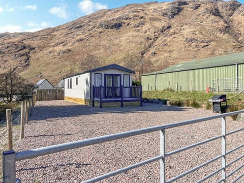 exteriand enclosed garden area | Katie’s Cosy Caravan - Shepherds Holidays, Kilmallieu