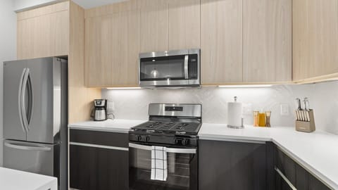 Pristine Modern Kitchen with Silver Appliances