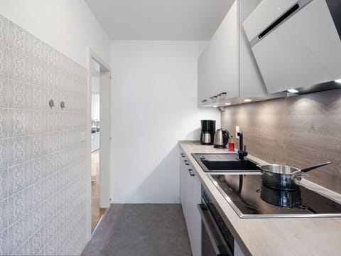 Kitchen, Countertop, Major Appliance, Kitchen Appliance, Flooring, Kitchen Sink, Interior Design, Kitchen Stove, Cabinetry, Floor