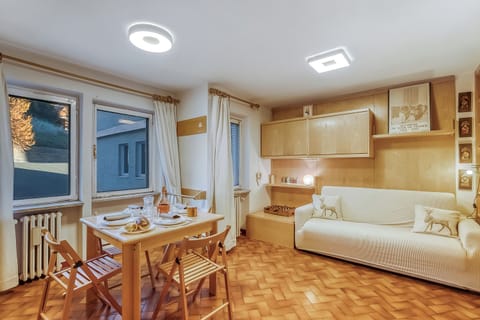 Family Apartment, 1 Bedroom (Appartamento Gran Roc few steps from) | Living area | 21-inch flat-screen TV with digital channels, TV