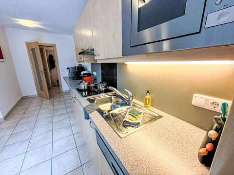 Property, Cabinetry, Countertop, Interior Design, Flooring, Floor, Home Appliance, Kitchen, Wall, Kitchen Appliance