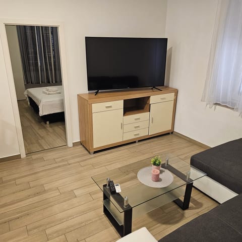 Comfort Apartment, 2 Bedrooms | Living area | Flat-screen TV