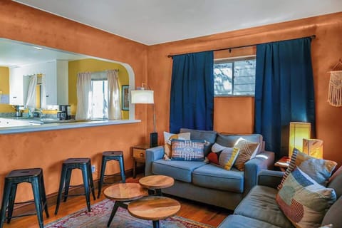 The living room is a stylish and comfortable space, featuring cozy seating, elegant decor, and a welcoming ambiance—perfect for relaxing and unwinding.