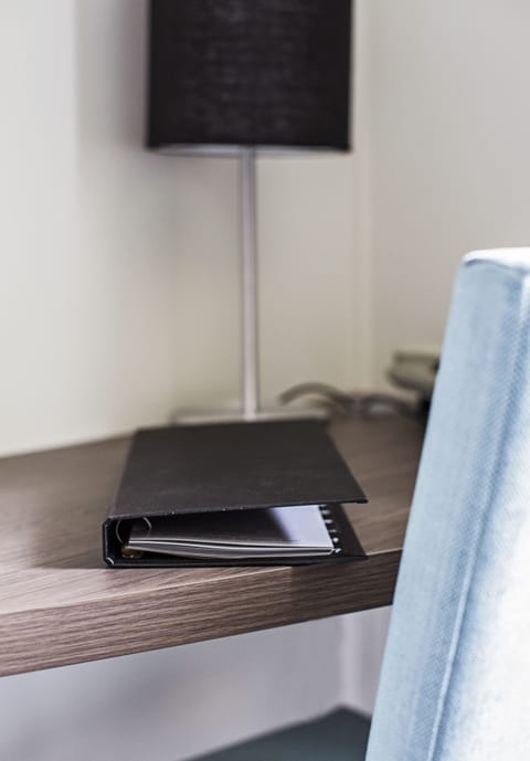 Premium bedding, pillowtop beds, desk, blackout drapes