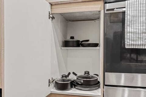 The kitchen invites you to experiment with new recipes, offering a stylish and practical space to cook and create.