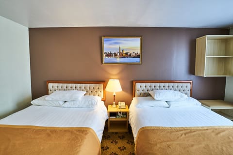 Queen Room with Two Queen Beds | In-room safe, desk, iron/ironing board, free WiFi