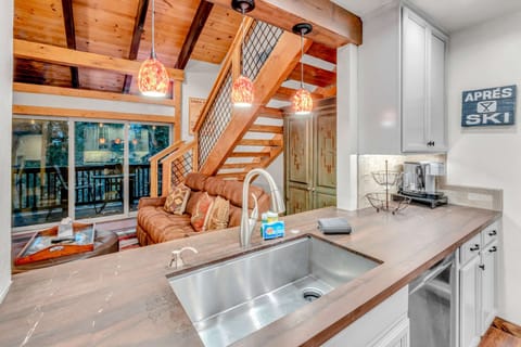 Kitchen: Well-equipped kitchen, Keurig, Crockpot, waffle maker, open layout to living room