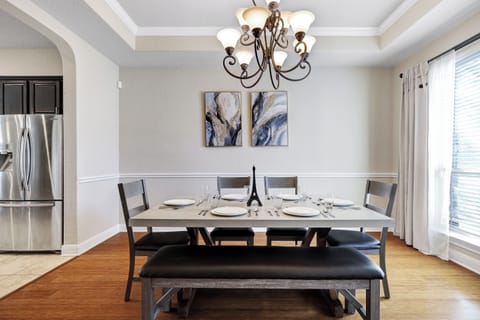 Spacious main dining table that sits 6 with full tableware and silverware included.