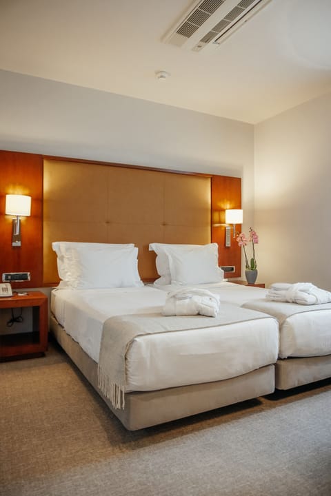 Double or Twin Room | Premium bedding, minibar, in-room safe, desk