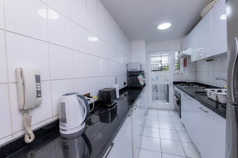 Family Apartment, Balcony, Courtyard View | Private kitchen | Microwave, oven, cookware/dishes/utensils