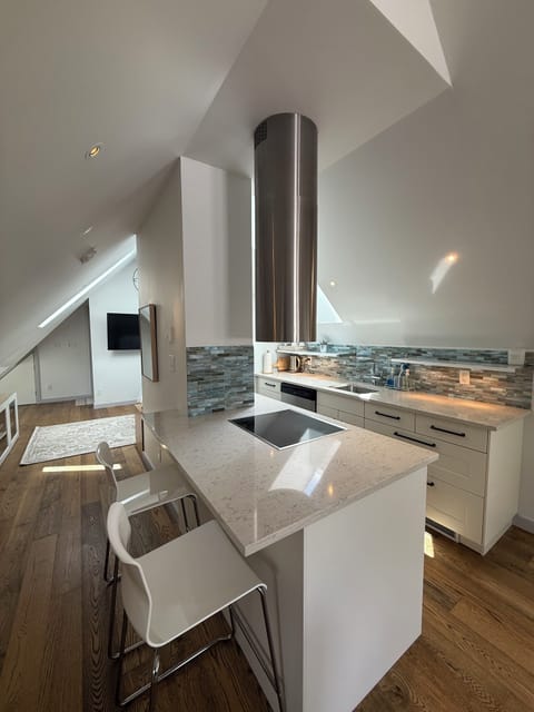 View of Kitchen and hallway to bedroom.