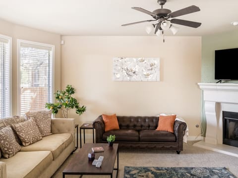 Living room with 2 comfortable couches and 2 chairs