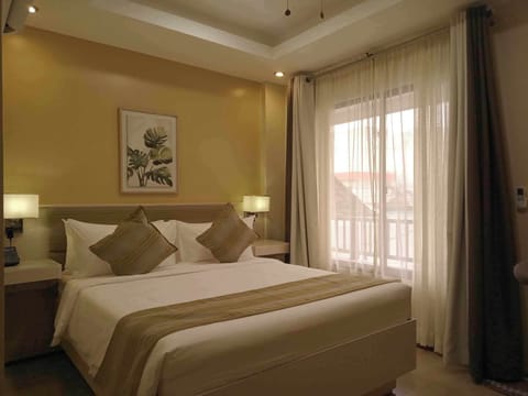 Deluxe Room, Pool View | Desk, laptop workspace, free WiFi