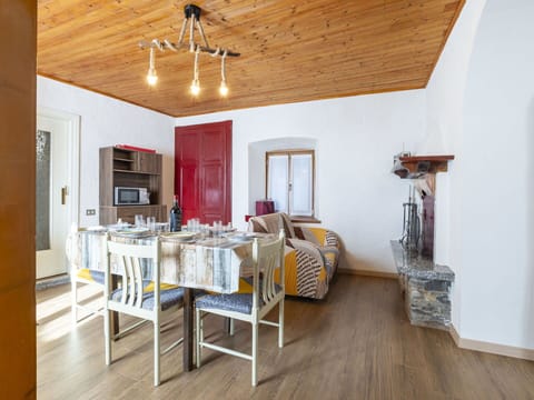 Property, Furniture, Picture Frame, Table, Wood, Interior Design, Ceiling Fan, Living Room, Flooring, Beam