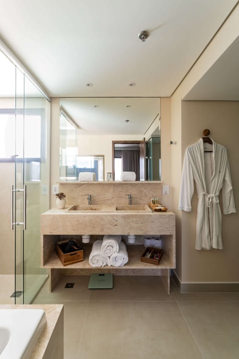 Suite, 1 King Bed | Bathroom | Shower, eco-friendly toiletries, hair dryer, towels