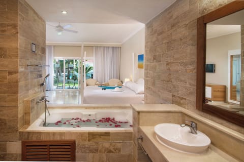 Deluxe Room, Balcony, Beach View | Bathroom | Shower, hair dryer, towels, soap