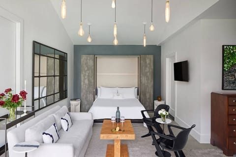 Luxury Suite, Patio, Pool View | In-room safe, soundproofing, free WiFi