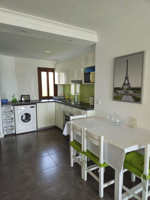 Comfort Apartment, Beachfront | Private kitchen | Full-size fridge, microwave, oven, stovetop