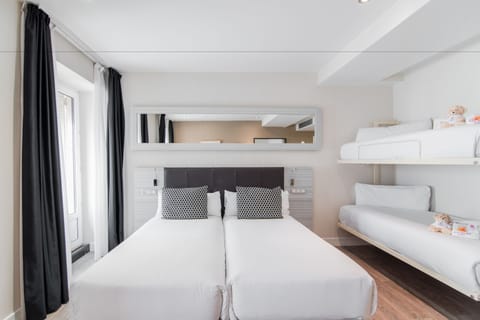 Quadruple Room | Down comforters, minibar, in-room safe, desk