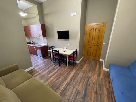 Family Apartment, 1 Bedroom, Non Smoking, Air conditioning | Living area