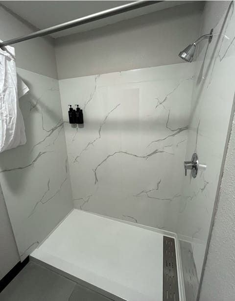 Shower, towels, soap, shampoo