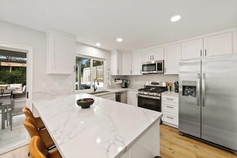 Well supplied kitchen with many new appliances