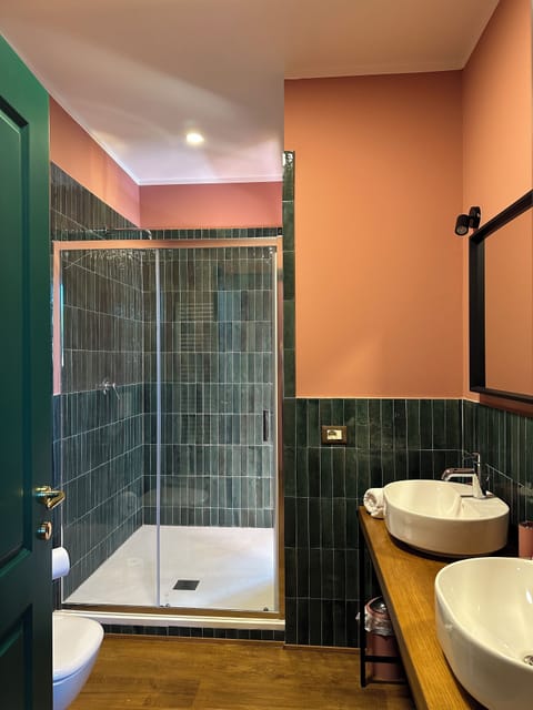 Deluxe Double Room, Golf View | Bathroom | Shower, hair dryer, towels, soap