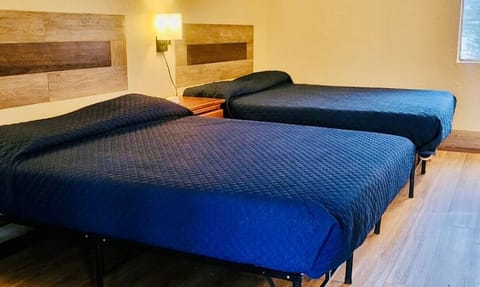 Double Room, 2 Queen Beds, Smoking | Desk, laptop workspace, free WiFi