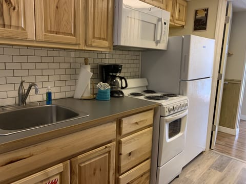 Condo, 1 Bedroom (211) | Private kitchenette | Fridge, microwave, stovetop, coffee/tea maker