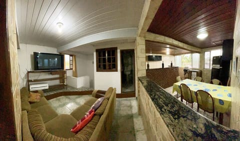 Family Apartment, Beach View | Living area | TV