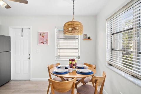Enjoy the bohemian vibes of the 4-person dining area or exit to the intimate side patio