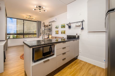 Basic Apartment | Private kitchen | Microwave, espresso maker, electric kettle, toaster