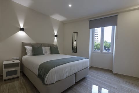 Luxury Apartment, 2 Bedrooms, Balcony, City View | Pillowtop beds, minibar, in-room safe, iron/ironing board