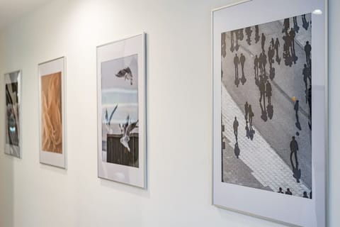 Modern hallway decor with curated artwork, adding a touch of sophistication.